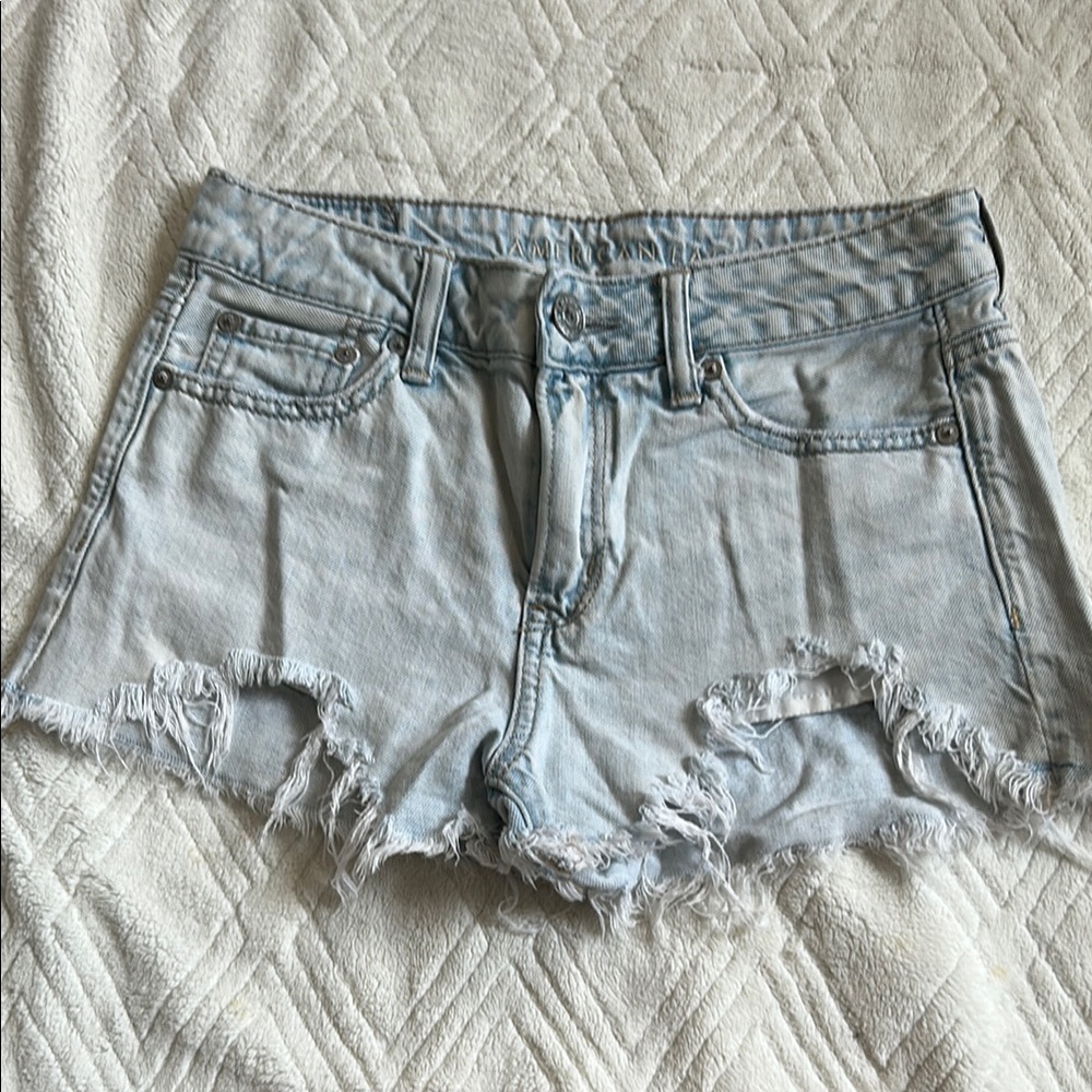 American Eagle TomGirl Shortie Light Blue Distressed Denim Shorts